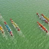 Đua thuyền trên sông Hàn chào mừng ngày Giải phóng thành phố Đà Nẵng. (Ảnh: Trần Lê Lâm/TTXVN) 