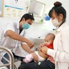 Tiêm chủng vaccine cho trẻ nhỏ. (Ảnh: TTXVN/Vietnam+) 