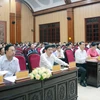 Các đại biểu dự hội nghị tại điểm cầu Ủy ban Nhân dân tỉnh Hà Nam. (Ảnh: Nguyễn Chinh/TTXVN)