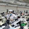 Mặt hàng may mặc, xơ, sợi, vải... cũng là mặt hàng xuất khẩu của tỉnh Bà Rịa-Vũng Tàu có kim ngạch giảm mạnh từ đầu năm 2023 đến nay. (Ảnh: Hoàng Nhị/TTXVN)