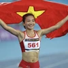 Vận động viên Nguyễn Thị Oanh lập kỷ lục trở thành vận động viên đầu tiên của điền kinh Việt Nam giành 4 huy chương Vàng cá nhân tại đấu trường SEA Games. (Ảnh: Minh Quyết/TTXVN) 
