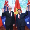 Thủ tướng Phạm Minh Chính và Toàn quyền Australia David Hurley. (Ảnh: Dương Giang/TTXVN) 