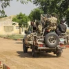 Binh sỹ quân đội Nigeria tuần tra. (Ảnh: AFP/TTXVN) 