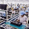 Dây chuyền sản xuất điện thoại di động tại Nhà máy sản xuất điện thoại di động Samsung Việt Nam ở tỉnh Bắc Ninh. Ảnh minh họa. (Ảnh: Đức Tám/TTXVN)