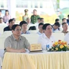 Thủ tướng Phạm Minh Chính và các đại biểu dự lễ khánh thành 2 tuyến cao tốc Vĩnh Hảo-Phan Thiết và Nha Trang-Cam Lâm. (Ảnh: Dương Giang/TTXVN) 