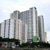 Các tòa nhà chung cư bên kênh Tàu Hủ-Bến Nghé, quận 4, Thành phố Hồ Chí Minh. (Ảnh: Hồng Đạt/TTXVN) 