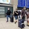 Khách nước ngoài nhập cảnh Hàn Quốc tại Sân bay Quốc tế Incheon. (Ảnh: Anh Nguyên/TTXVN) 