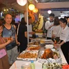 Gian hàng ẩm thực Tây Bắc tại Liên hoan ẩm thực Quảng Ninh năm 2023 thu hút du khách. (Ảnh: Thanh Vân/TTXVN) 