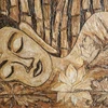 Tranh vỏ tràm khắc họa chân dung Phật Thích ca Tượng nằm. (Ảnh: Văn Sĩ/TTXVN)