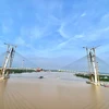 Cầu Mỹ Thuận 2 có nhịp chính kết cấu dây văng dài 650m; nhịp dẫn kết cầu dầm Super T và dầm hộp đúc hẫng cân bằng dài 1.276m. (Ảnh: Huy Hùng/TTXVN) 
