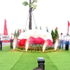 Các đại biểu thực hiện nghi thức gắn biển Đại lộ Võ Văn Kiệt. (Ảnh: Mạnh Tú/TTXVN)