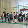 Công dân nước ngoài nhập cảnh bằng thị thực điện tử vào Việt Nam qua cửa khẩu quốc tế Hữu Nghị (Lạng Sơn). (Ảnh: Quang Duy/TTXVN)