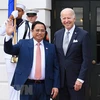 Tổng thống Hoa Kỳ Joseph Robinette Biden Jr. đón Thủ tướng Phạm Minh Chính trong khuôn khổ Hội nghị Cấp cao đặc biệt ASEAN-Hoa Kỳ tại thủ đô Washington DC, ngày 12/5/2023. (Ảnh: Dương Giang/TTXVN)