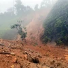 Sạt lở khối lượng lớn đất đá trên tuyến đường Hồ Chí Minh tại km 392 đoạn ngang qua xã A Roàng, huyện A Lưới, tỉnh Thừa Thiên-Huế. (Ảnh: TTXVN phát) 