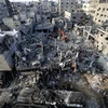 Cảnh đổ nát sau các vụ oanh tạc của Israel xuống thị trấn Khan Yunis, phía Nam Dải Gaza ngày 25/10/2023. (Ảnh: AFP/TTXVN)