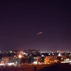 Lực lượng phòng không Syria đánh chặn tên lửa do Israel phóng xuống sân bay Damascus. (Ảnh: AFP/TTXVN) 
