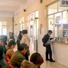 Người dân chờ cấp thuốc tại phòng cấp thuốc bảo hiểm y tế của Bệnh viện Đa khoa Lâm Đồng. (Nguồn: Báo Lâm Đồng) 