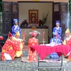 Thực hiện nghi thức tế Thần Nông tại Lễ hội Kỳ Yên Thượng Điền Đình Thần Tân An. (Ảnh: Trung Kiên/TTXVN)