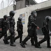Cảnh sát Ecuador tuần tra tại Quito, sau khi Tổng thống ban bố tình trạng xung đột vũ trang trong nước ngày 9/1/2024. (Ảnh: THX/TTXVN)
