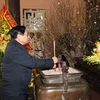 Thủ tướng Phạm Minh Chính dâng hương tưởng niệm Chủ tịch Hồ Chí Minh ở Thanh Hóa. (Ảnh: Dương Giang/TTXVN)