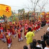 Lễ rước kiệu từ đền Cổ Ngựa đến đền Chúa Then trong Lễ hội mở cửa rừng tại Bắc Giang. (Ảnh: Danh Lam/TTXVN)