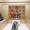 Phó Thủ tướng Trần Hồng Hà chủ trì cuộc họp lấy ý kiến về Chiến lược phát triển giáo dục. (Ảnh: Văn Điệp/TTXVN)