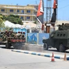 Binh sỹ Somalia tuần tra gần hiện trường vụ tấn công nhằm vào khách sạn ở Mogadishu, Somalia, ngày 15/3/2024. (Ảnh: AFP/TTXVN)