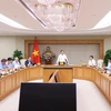 Phó Thủ tướng Trần Hồng Hà chủ trì cuộc họp về Dự thảo Nghị định quy định cơ chế, chính sách khuyến khích phát triển điện mặt trời áp mái. (Ảnh: Văn Điệp/TTXVN)