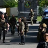 Lực lượng an ninh được triển khai tại hiện trường 7 cảnh sát thương vong khi đấu súng với nghi phạm ở thành phố Charlotte, bang Bắc Carolina, Mỹ ngày 29/4/2024. (Ảnh: AA/TTXVN)