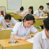 Thí sinh dự thi lớp 10 trung học phổ thông công lập Hà Nội năm 2023. (Ảnh: Thanh Tùng/TTXVN)