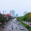 Những con phố của Hà Nội rực rỡ giữa mùa hoa tháng 5. (Ảnh: Tuấn Anh/TTXVN)