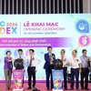 Các đại biểu thực hiện nghi lễ khai mạc HCMC Foodex 2024. (Ảnh: Xuân Anh/TTXVN)