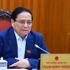 Thủ tướng Phạm Minh Chính chủ trì họp Thường trực Chính phủ về kiểm soát lạm phát. (Ảnh: Dương Giang/TTXVN)