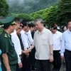 Chủ tịch nước Tô Lâm với các đại biểu tại Khu Di tích Quốc gia Đặc biệt Pác Bó. (Ảnh: Nhan Sáng/TTXVN)
