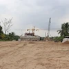 Công tác giải phóng mặt bằng ở xã Thới Sơn, thành phố Mỹ Tho, tỉnh Tiền Giang đã hoàn tất, phục vụ thi công dự án cầu Rạch Miễu 2. (Ảnh: Hữu Chí/TTXVN)
