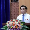 Ông Lê Văn Dũng phát biểu nhận chức chủ tịch Ủy ban Nhân dân tỉnh Quảng Nam nhiệm kỳ 2021-2026. (Ảnh Trần Tĩnh/TTXVN)