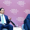 Thủ tướng Phạm Minh Chính toạ đàm với cộng đồng doanh nghiệp khởi nghiệp, đổi mới sáng tạo của WEF. (Ảnh: Dương Giang/TTXVN)