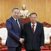 Chủ tịch nước Tô Lâm gặp nguyên Tổng Bí thư, Chủ tịch nước Lào Bounnhang Vorachith. (Ảnh: Nhan Sáng/TTXVN)