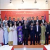 Chủ tịch nước Tô Lâm với cán bộ, nhân viên Đại sứ quán và đại diện cộng đồng người Việt Nam tại Campuchia. (Ảnh: Nhan Sáng/TTXVN)