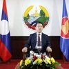 Phó Thủ tướng, Bộ trưởng Bộ Ngoại Giao Lào Saleumxay Kommasith chủ trì họp báo. (Ảnh: Phạm Kiên/TTXVN)