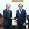 Phó Thủ tướng Trần Lưu Quang tiếp Đại sứ Trung Quốc tại Việt Nam Hùng Ba đến chào từ biệt. (Ảnh: Phạm Kiên/TTXVN)