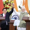 Thủ tướng Phạm Minh Chính​ và Thủ tướng Ấn Độ Narendra Modi sau khi kết thúc cuộc gặp gỡ báo chí hai nước. (Ảnh: Dương Giang/TTXVN)