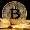 (Tư liệu) Đồng tiền điện tử bitcoin. (Ảnh: Getty Images/TTXVN)