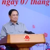 Thủ tướng Phạm Minh Chính chủ trì Hội nghị về chống khai thác hải sản bất hợp pháp. (Ảnh: Dương Giang/TTXVN)