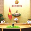 Thủ tướng Phạm Minh Chính chủ trì Phiên họp Chính phủ chuyên đề pháp luật. (Ảnh: Dương Giang/TTXVN)