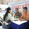 Đơn vị sản xuất và đại diện hệ thống phân phối kết nối cung cầu trong khuôn khổ Hội nghị. (Ảnh: Xuân Anh/ TTXVN)