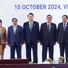 Thủ tướng Phạm Minh Chính cùng Trưởng đoàn các nước ASEAN và Thủ tướng Trung Quốc Lý Cường; Tổng thống Yoon Suk Yeol và Thủ tướng Nhật Bản Ishiba Shigeru chụp ảnh chung. (Ảnh: Dương Giang/TTXVN)