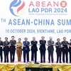 Thủ tướng Phạm Minh Chính cùng Trưởng đoàn các nước ASEAN và Thủ tướng Trung Quốc Lý Cường chụp ảnh chung. (Ảnh: Dương Giang/TTXVN)