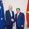 Thủ tướng Phạm Minh Chính gặp Thủ tướng Australia Anthony Albanese. (Ảnh: Dương Giang/TTXVN)