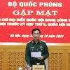 Đại tướng Phan Văn Giang chủ trì buổi gặp mặt. (Ảnh: Hồng Pha/TTXVN phát)